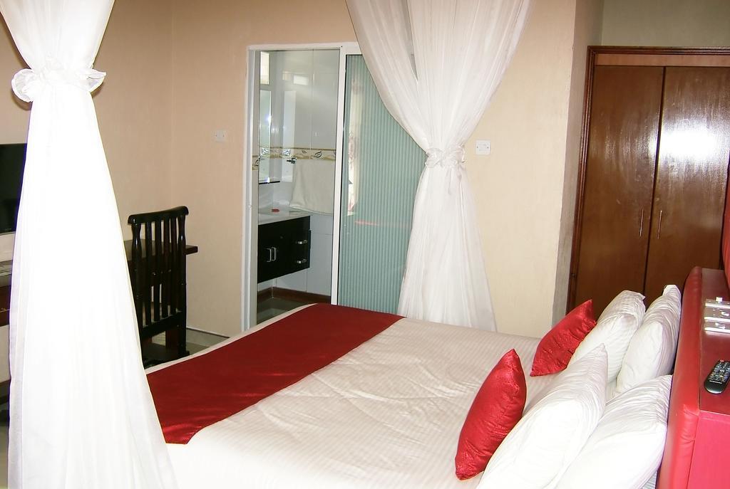 Milimani Holiday Resort Kisumu Quarto foto